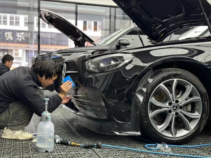 Paint protection film being installed on a vehicle
